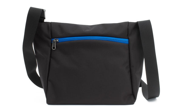 Reverse shot of an Icon in Black 525 Ballistic with Island (blue) zippers.